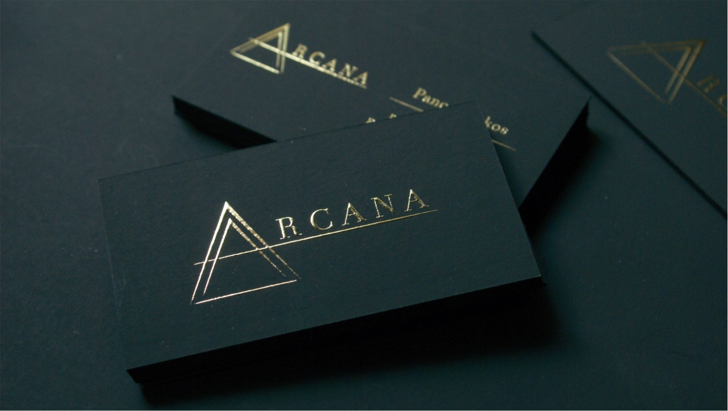 Premium business cards - black cardstock with raised gold foil