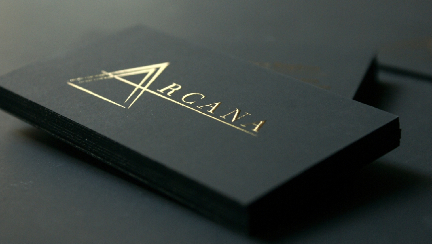 Black premium business cards with raised gold foil